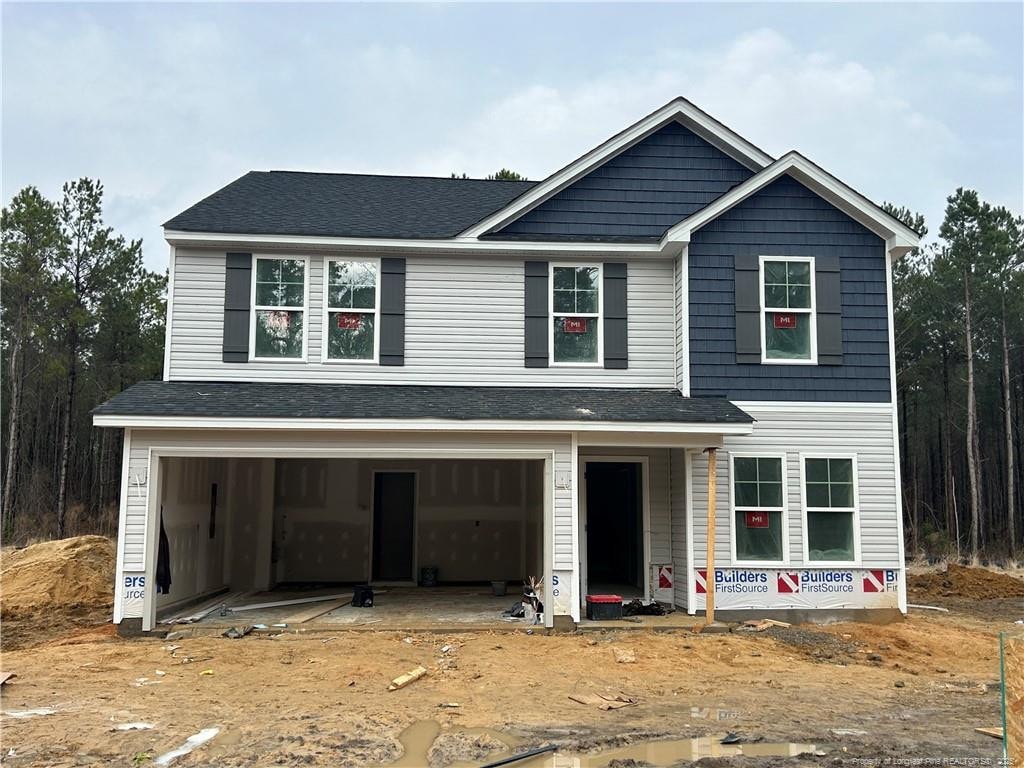 view of front of house with a garage