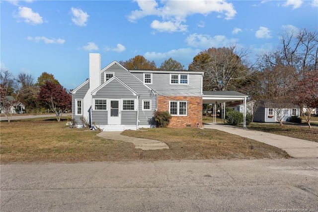 front facade featuring a carport and a front lawn