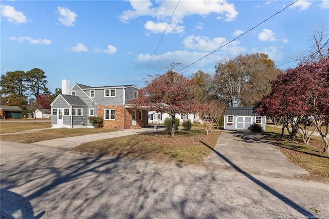 view of front of home with an outbuilding