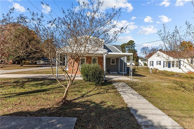 bungalow-style home featuring a front lawn