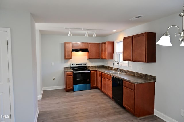 kitchen with dishwasher, sink, light hardwood / wood-style floors, stainless steel electric range, and decorative light fixtures