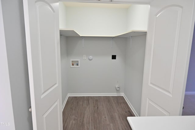 washroom featuring washer hookup, hardwood / wood-style flooring, gas dryer hookup, and electric dryer hookup