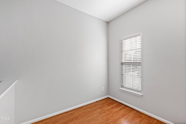 empty room featuring hardwood / wood-style floors