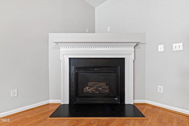 details featuring wood-type flooring