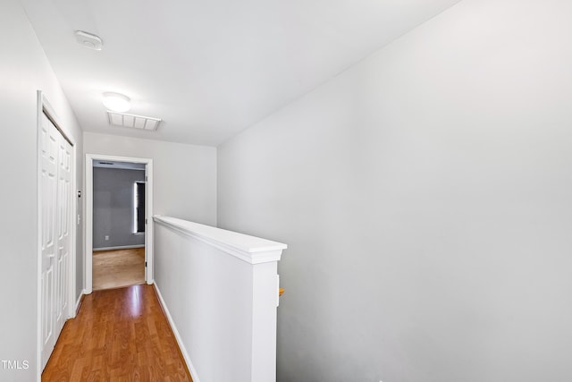 hallway featuring hardwood / wood-style floors