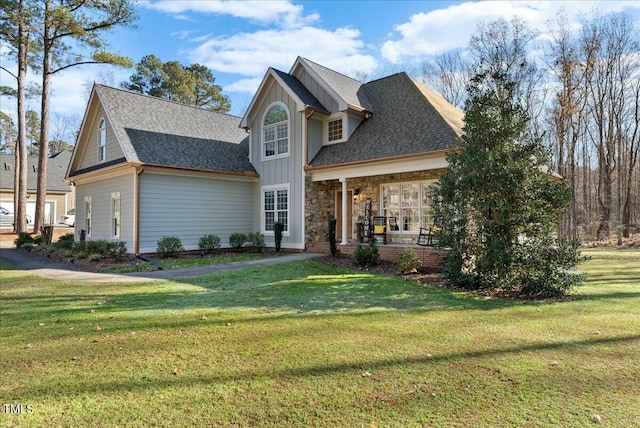 view of front of home featuring a porch and a front yard