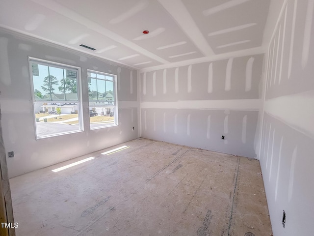 spare room featuring visible vents