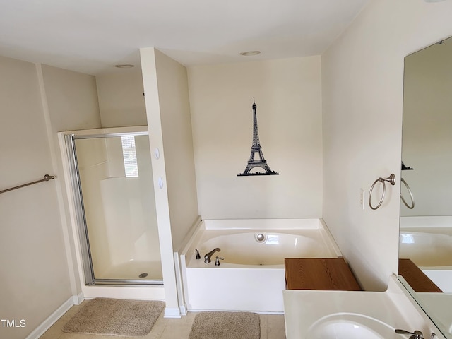 bathroom featuring tile patterned flooring and plus walk in shower