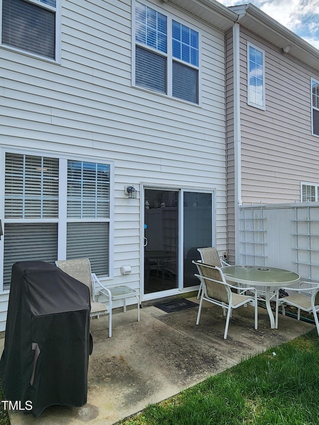 back of house featuring a patio area