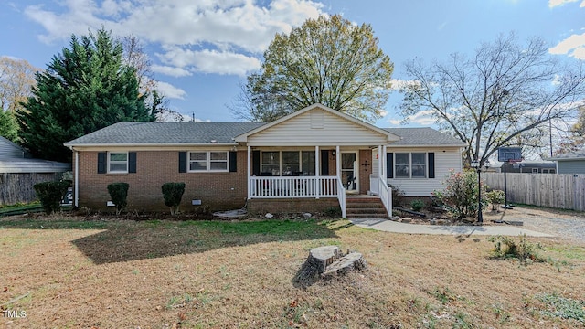 view of front of house featuring a front lawn and a porch