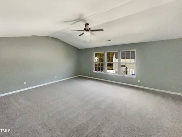 unfurnished room featuring ceiling fan and lofted ceiling