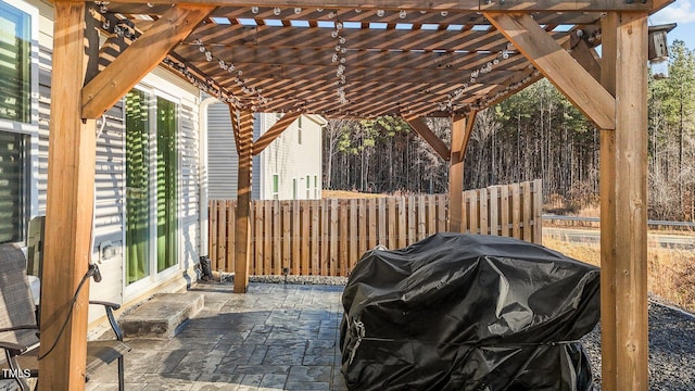 view of patio / terrace featuring a pergola and grilling area