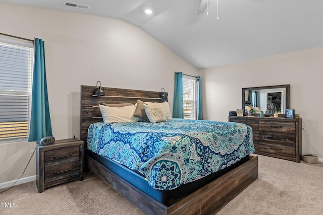 bedroom featuring carpet, vaulted ceiling, and ceiling fan