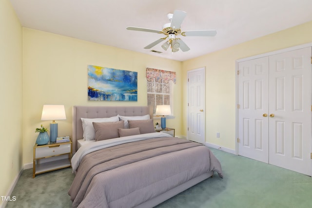 carpeted bedroom featuring ceiling fan