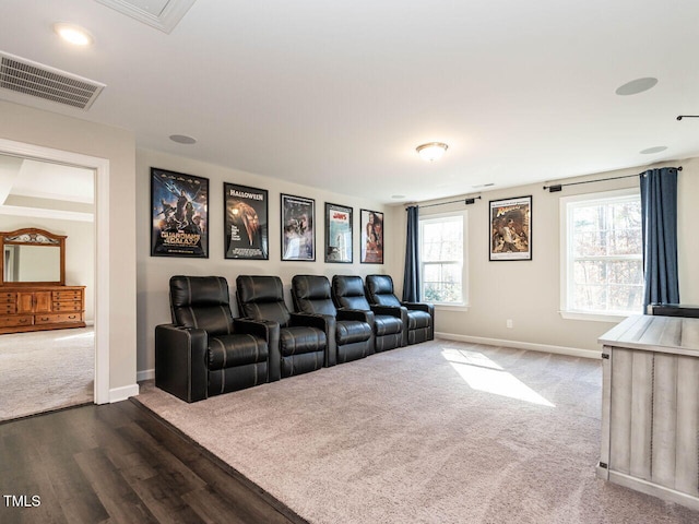 home theater featuring hardwood / wood-style floors