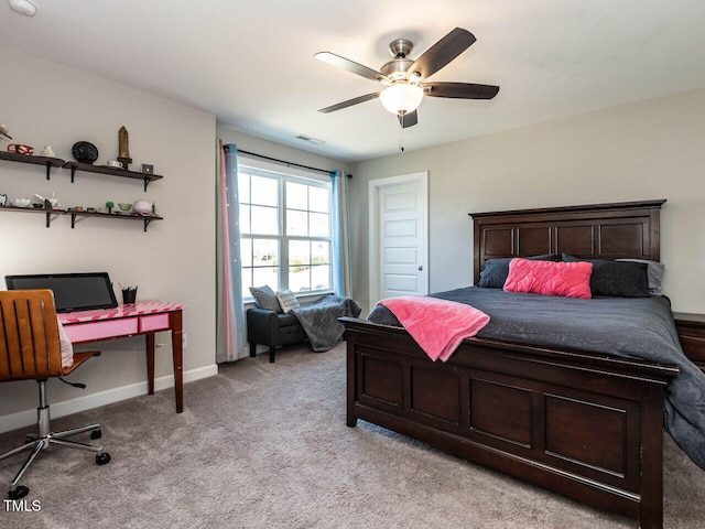 carpeted bedroom with ceiling fan