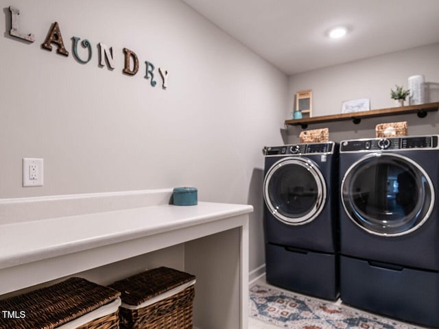 laundry area with washer and dryer