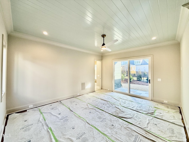 spare room featuring ceiling fan and ornamental molding