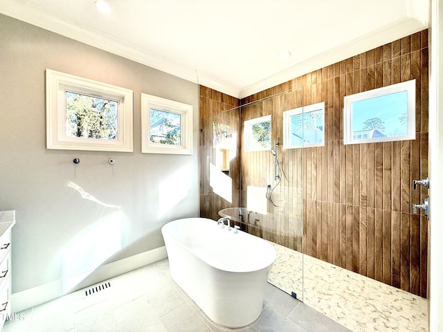 bathroom with separate shower and tub, vanity, and crown molding