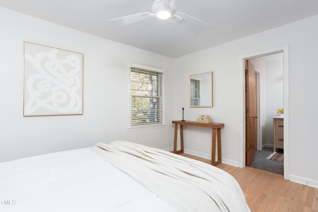 bedroom featuring ceiling fan and light hardwood / wood-style floors