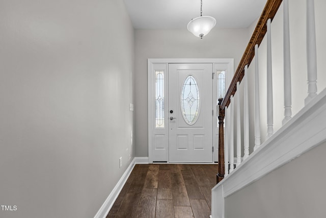 entryway with dark wood-type flooring