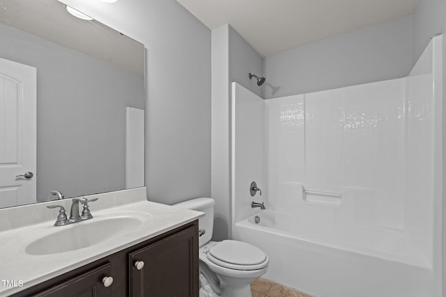 full bathroom featuring tile patterned flooring, vanity, toilet, and shower / tub combination