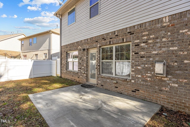 exterior space with a yard and a patio area