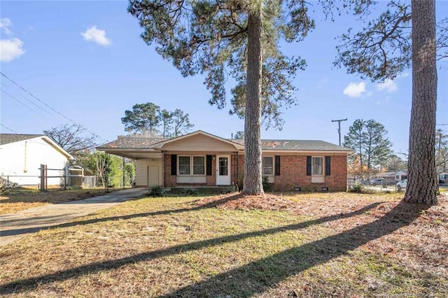 single story home with a carport and a front yard