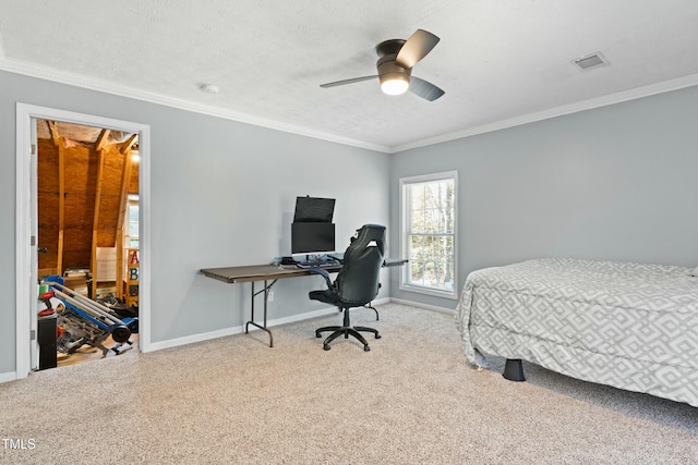 bedroom with ceiling fan, crown molding, light colored carpet, and a textured ceiling