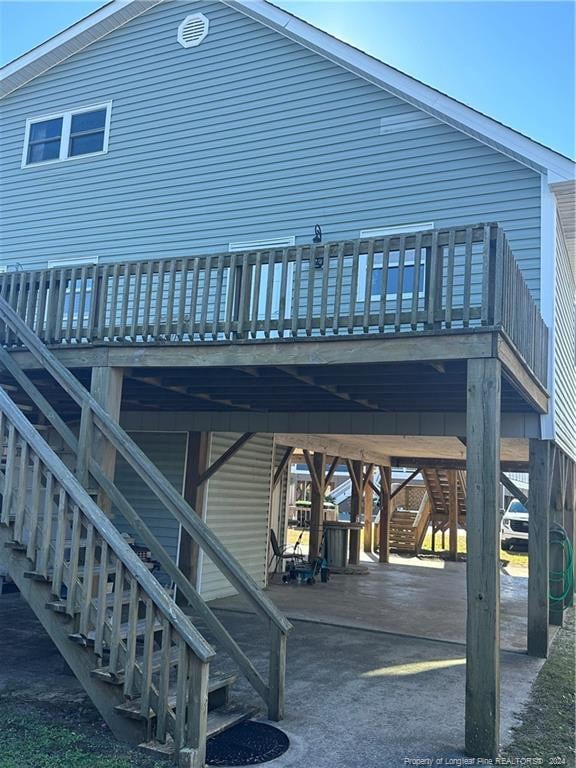 rear view of house with a deck