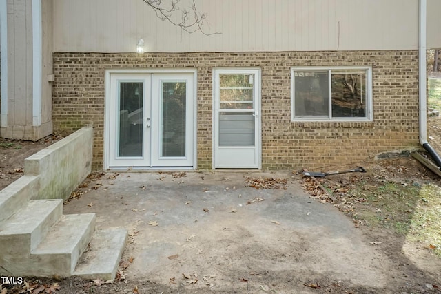 doorway to property with french doors and a patio