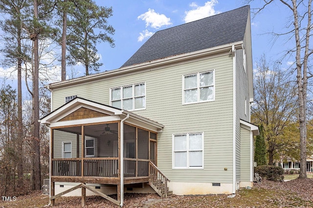 rear view of property with ceiling fan, roof with shingles, crawl space, and a sunroom