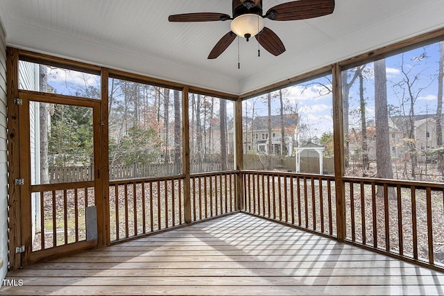 unfurnished sunroom featuring plenty of natural light