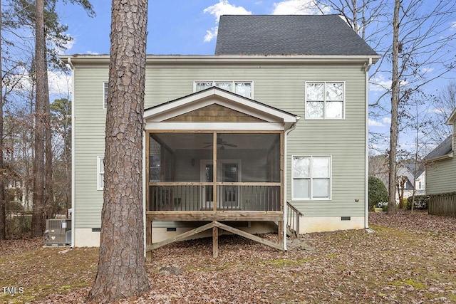 rear view of property with crawl space, a sunroom, and a ceiling fan