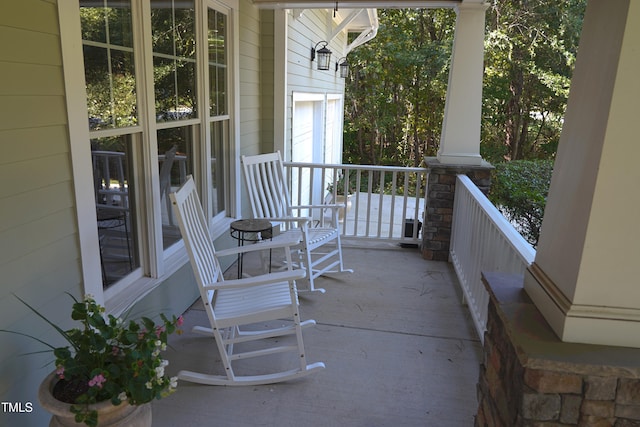 balcony featuring a porch