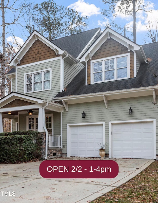 craftsman-style home with a garage and covered porch