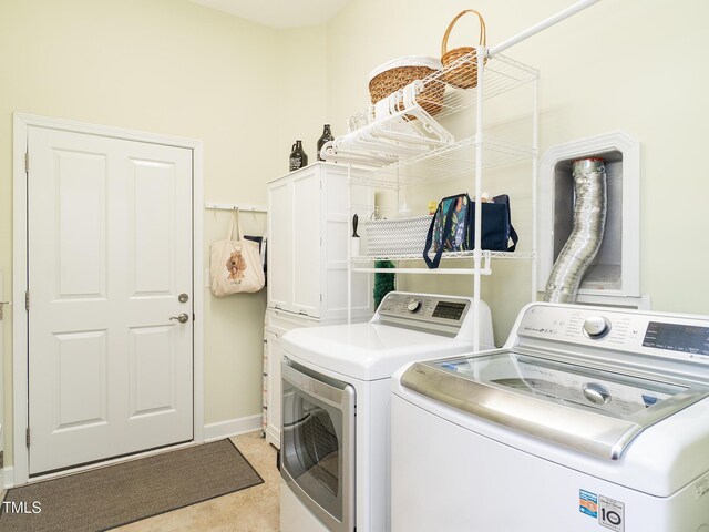 washroom with separate washer and dryer