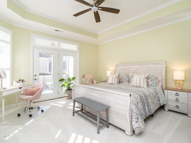 carpeted bedroom featuring access to outside, multiple windows, ceiling fan, and crown molding