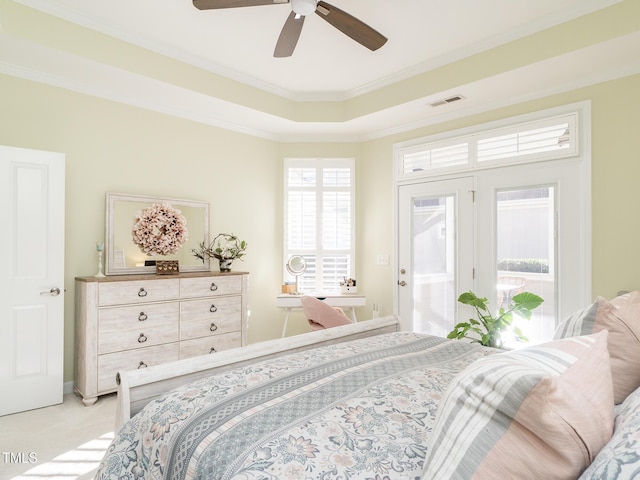 bedroom featuring ceiling fan, crown molding, and light carpet