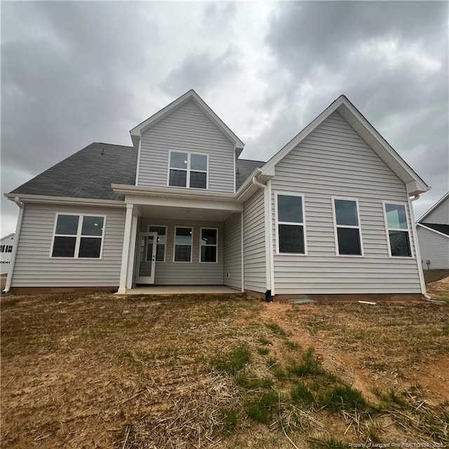 rear view of house with a patio area