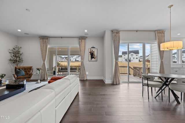 living room featuring dark hardwood / wood-style floors