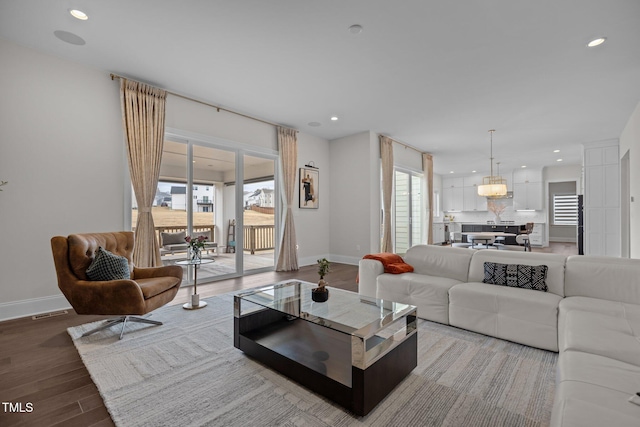 living room with light hardwood / wood-style floors