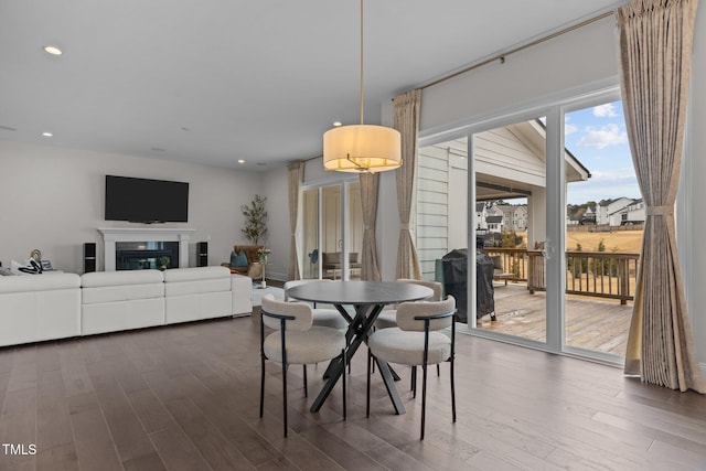 dining area featuring dark hardwood / wood-style floors