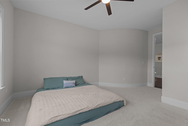 bedroom featuring ceiling fan and carpet floors