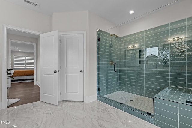 bathroom featuring wood-type flooring and walk in shower