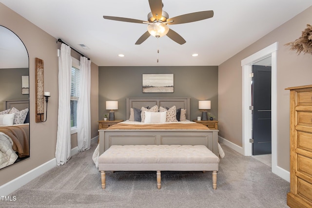 carpeted bedroom featuring ceiling fan