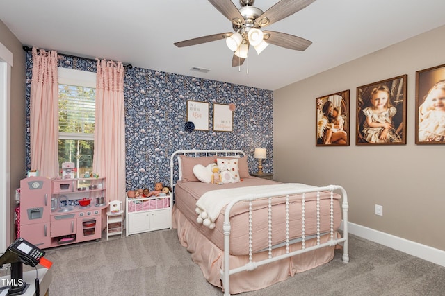 carpeted bedroom featuring ceiling fan