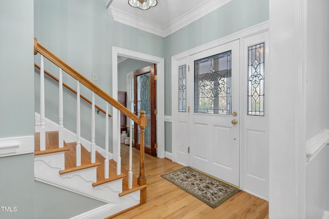 4027 Green Forest Ct, Rocky Mount, NC 27804 - foyer entrance with hardwood / wood-style floors, crown molding, and an inviting chandelier