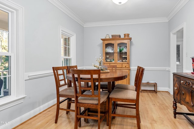 4027 Green Forest Ct, Rocky Mount, NC 27804 - dining room with light hardwood / wood-style floors and ornamental molding
