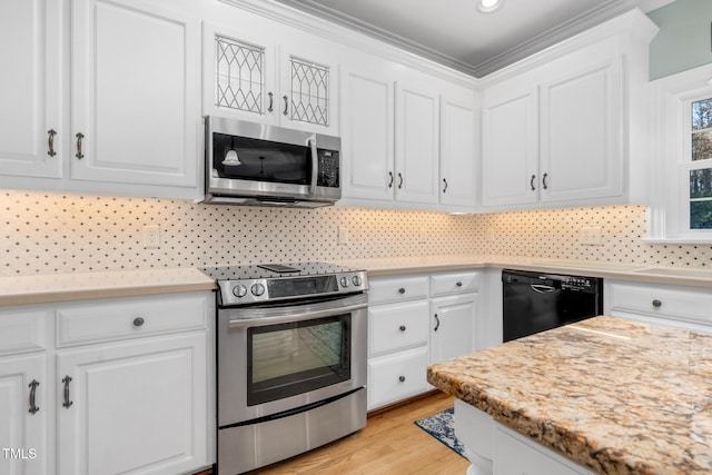 4027 Green Forest Ct, Rocky Mount, NC 27804 - kitchen with appliances with stainless steel finishes, tasteful backsplash, white cabinetry, and ornamental molding